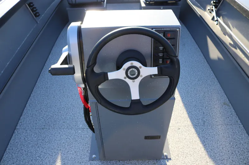 Slide: The Image of Steering console of 2026 Alumaweld Adventurer 20 boat, featuring a modern design. - 4