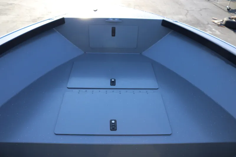 Slide: The Image of 2026 Alumaweld Adventurer 20 boat interior with storage compartments. - 7