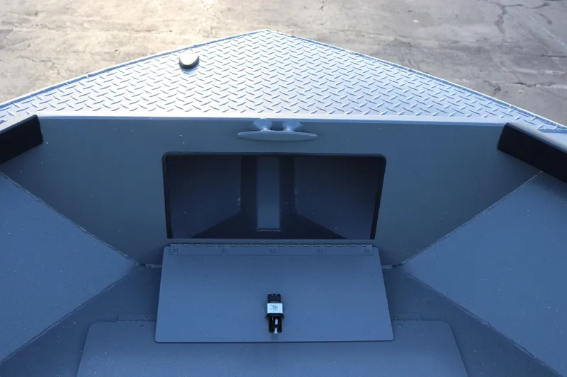 Slide: The Image of 2026 Alumaweld Adventurer 20 boat interior with diamond plate flooring. - 8