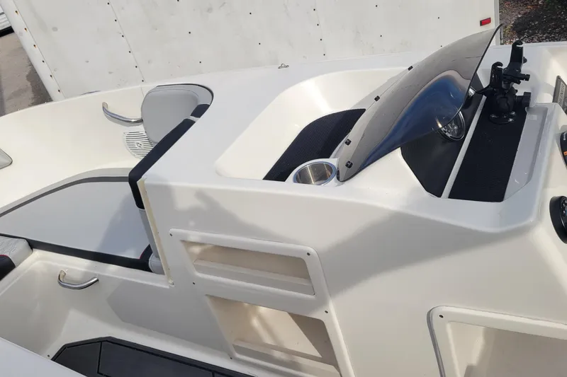 Slide: The Image of 2022 Bayliner Element M17 dashboard with steering wheel and instrument panel. - 11