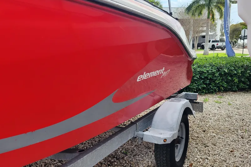 Slide: The Image of 2022 Bayliner Element M17 boat stern with outboard motor and swim platform. - 23