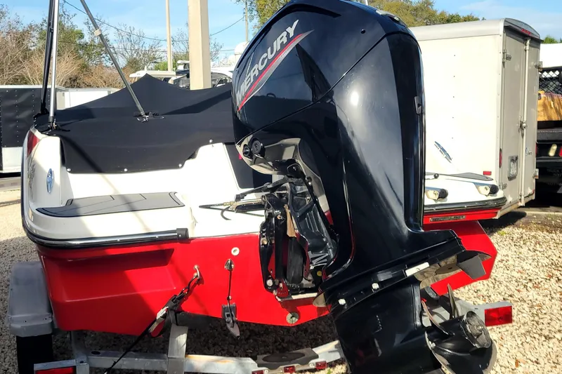 Slide: The Image of 2022 Bayliner Element M17 boat propeller on gravel surface. - 3