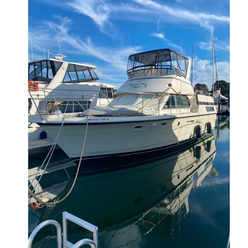 The Image of 1988 Hatteras 40 Double Cabin yacht docked in harbor. - 0