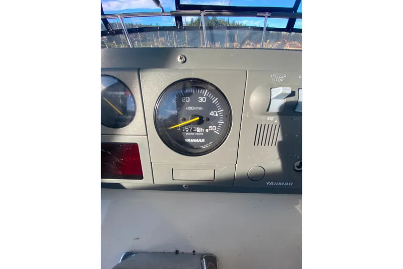 Slide: The Image of Instrument panel of 1988 Hatteras 40 Double Cabin with Yanmar engine gauge. - 44