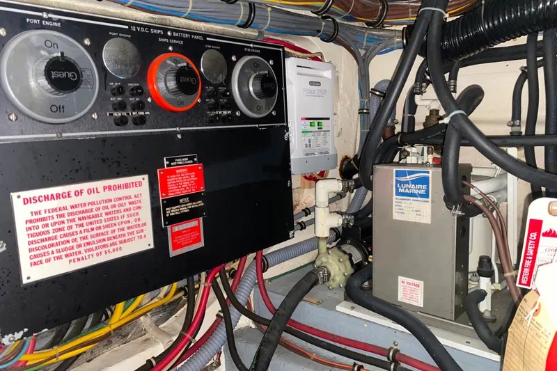 Slide: The Image of Electrical panel and equipment in 1988 Hatteras 40 Double Cabin engine room. - 65