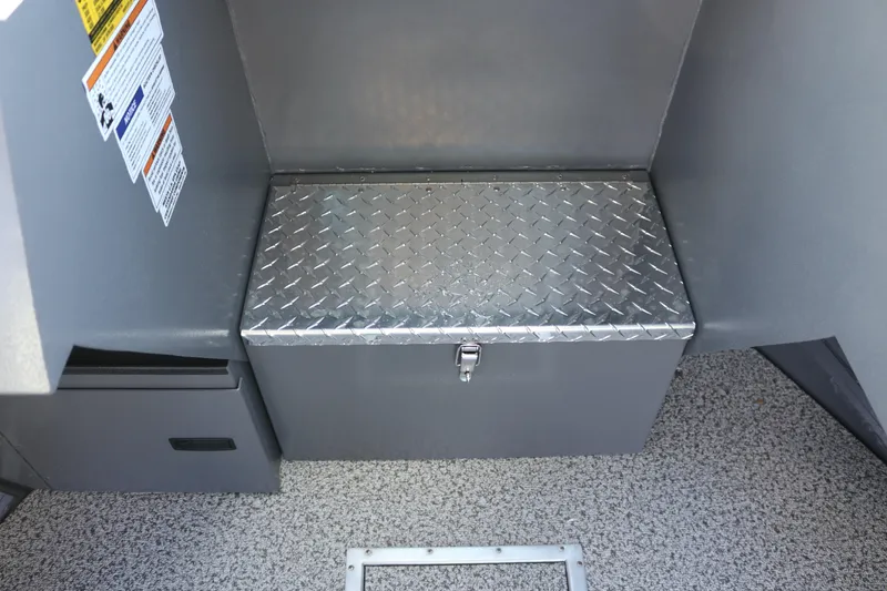 Slide: The Image of 2026 Alumaweld Intruder Hard Top 24 interior with diamond plate storage box. - 10