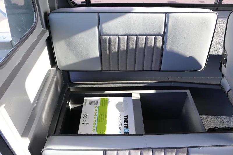 Slide: The Image of Interior seating storage of 2026 Alumaweld Intruder Hard Top 24 boat. - 16