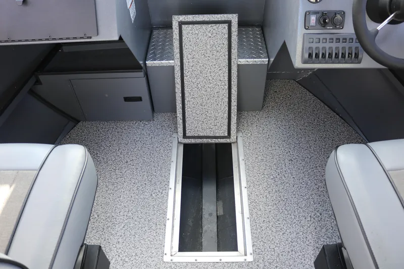 Slide: The Image of Interior of 2026 Alumaweld Intruder Hard Top 24, featuring sleek seating and storage. - 21