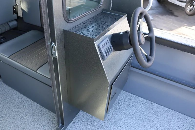 Slide: The Image of 2026 Alumaweld Intruder Hard Top 24 interior with steering wheel and seating. - 26