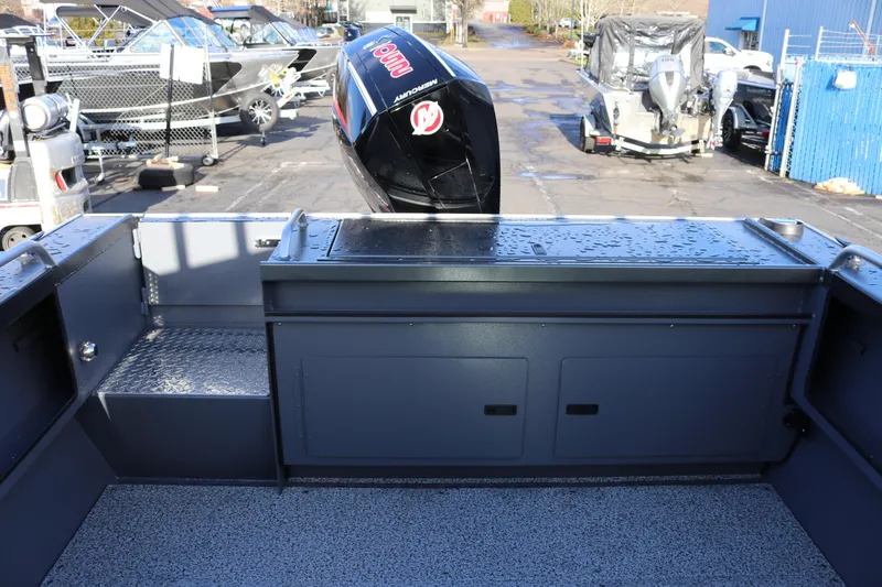 Slide: The Image of 2026 Alumaweld Intruder Hard Top 24 boat interior with Mercury outboard motor. - 28