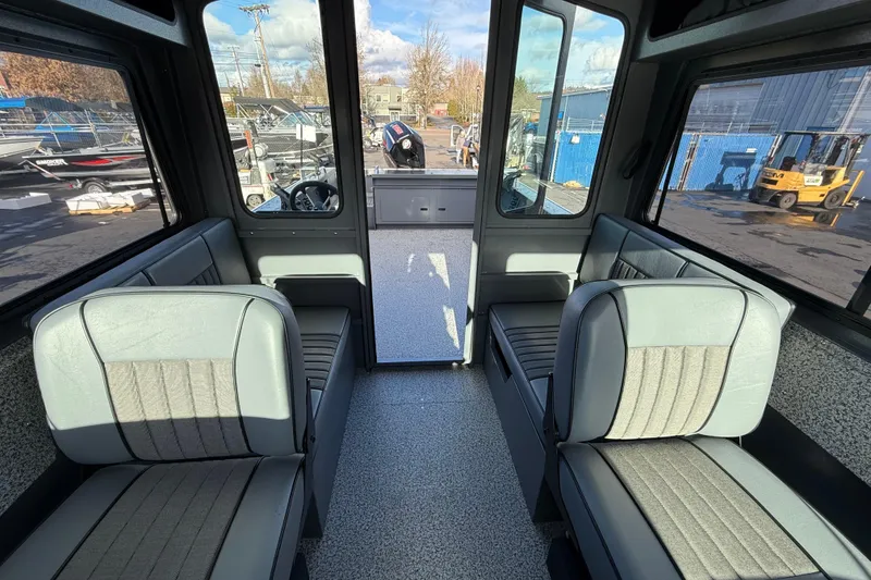 Slide: The Image of Interior of 2026 Alumaweld Intruder Hard Top 24 boat, featuring spacious seating and modern design. - 38