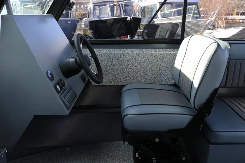 Slide: The Image of 2026 Alumaweld Intruder Hard Top 24 interior with steering wheel and seating. - 8