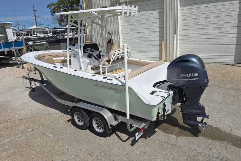 Slide: The Image of 2020 Sportsman Heritage 211 Center Console boat with Yamaha outboard motor on trailer. - 6