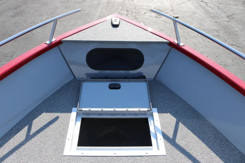 Slide: The Image of Bow view of 2026 Smoker Caft Pro Tracer 162 boat with storage compartment. - 13