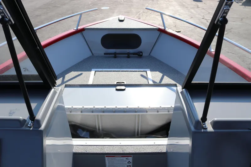 Slide: The Image of Bow view of Smoker Caft Pro Tracer 162 boat, 2026 model, with open storage compartment. - 15