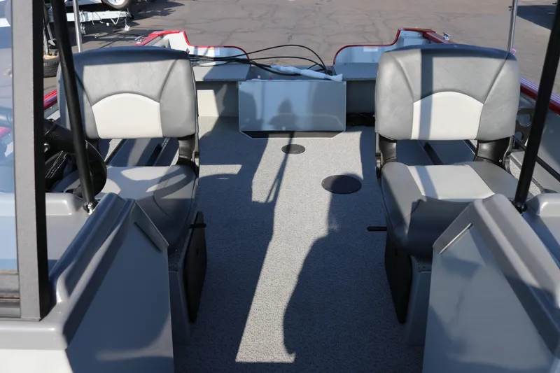 Slide: The Image of Interior of 2026 Smoker Caft Pro Tracer 162 boat with two gray seats. - 16