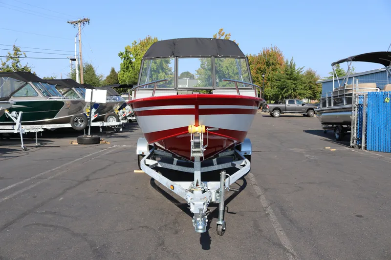 Slide: The Image of Red and white Smoker Caft Pro Tracer 162 boat on trailer, 2026 model. - 3