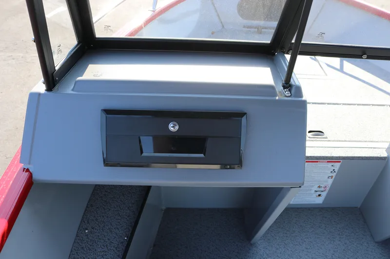 Slide: The Image of Dashboard of 2026 Smoker Caft Pro Tracer 162 boat with storage compartment. - 7