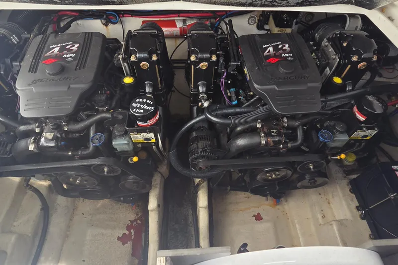 Slide: The Image of Twin MerCruiser 4.3 MPI engines in a 2006 Sea Ray Sundancer 280 boat. - 32