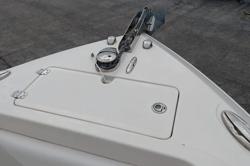 Slide: The Image of Bow of 2014 Sailfish 275 DC boat with anchor and hatch. - 22