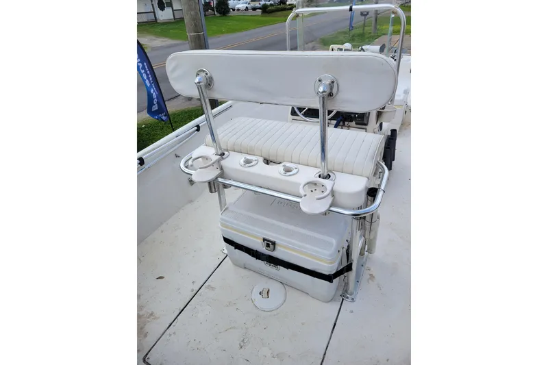 Slide: The Image of 2004 Sea Chaser 1950 RG boat interior with seating and storage. - 13