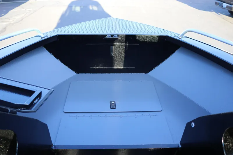 Slide: The Image of 2026 Alumaweld Stryker X202 boat interior with sleek, modern design and storage compartment. - 11