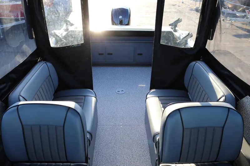 Slide: The Image of Interior of 2026 Alumaweld Stryker X202 boat with gray seating and spacious layout. - 15