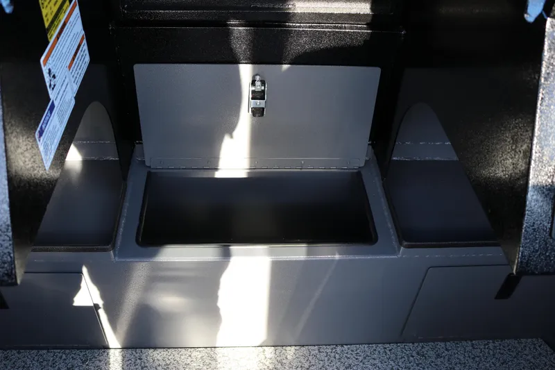 Slide: The Image of Storage compartment of 2026 Alumaweld Stryker X202 boat, featuring secure latch and durable design. - 24