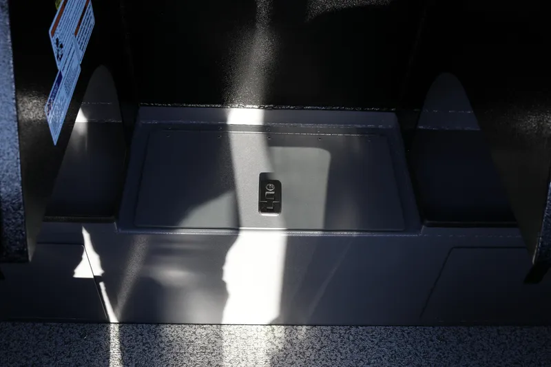 Slide: The Image of 2026 Alumaweld Stryker X202 boat interior detail with storage compartment. - 25
