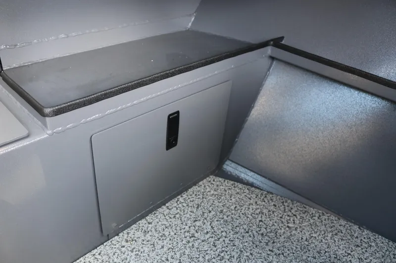 Slide: The Image of Interior storage compartment of 2026 Alumaweld Stryker X202 boat, featuring sleek design. - 28