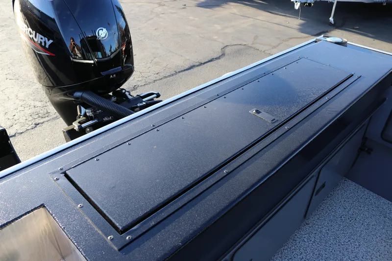 Slide: The Image of 2026 Alumaweld Stryker X202 boat with Mercury outboard motor, rear deck view. - 31