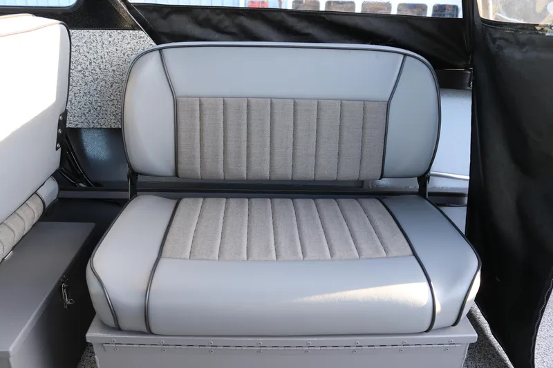 Slide: The Image of Gray cushioned seat in 2026 Alumaweld Stryker X202 boat interior. - 37