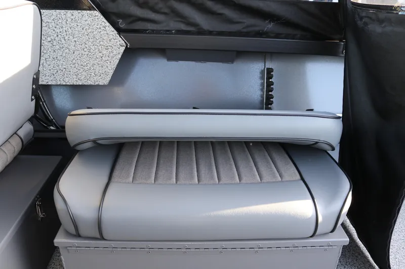Slide: The Image of 2026 Alumaweld Stryker X202 boat interior with gray cushioned seating. - 5