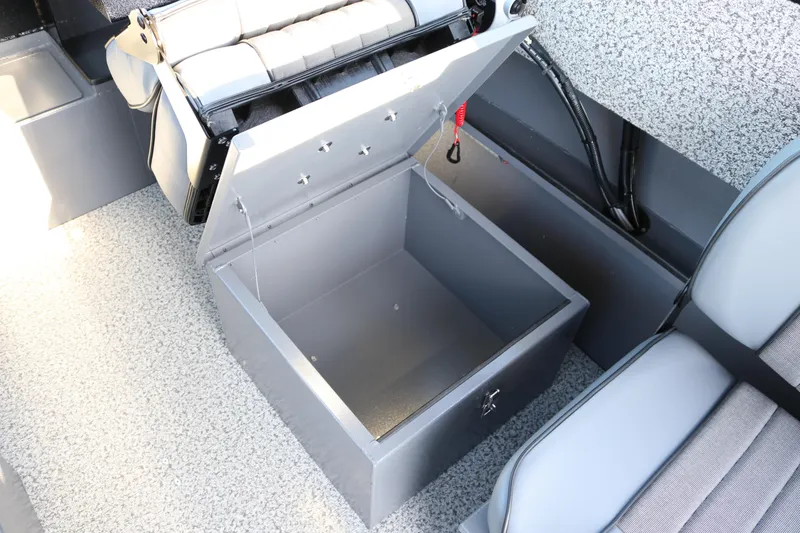 Slide: The Image of 2026 Alumaweld Stryker X202 boat interior with open storage compartment. - 8