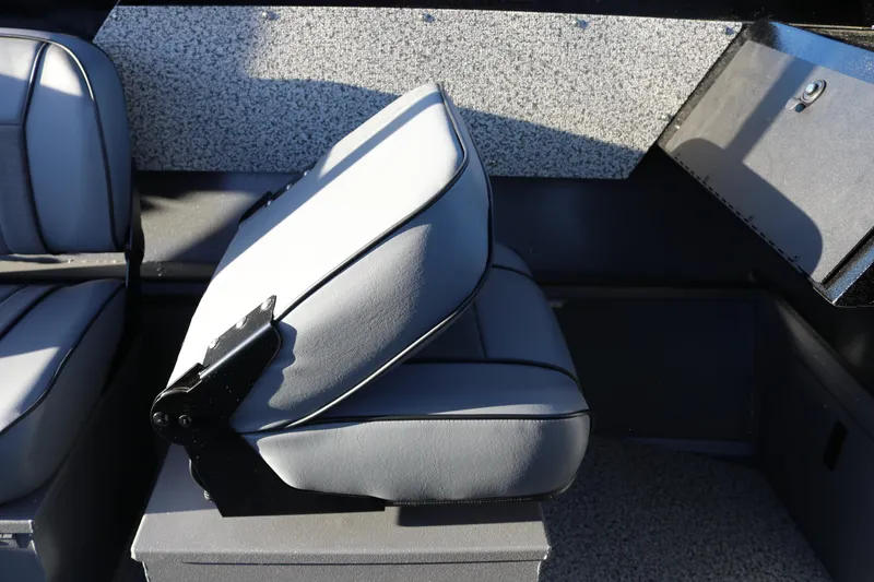 Slide: The Image of Interior seating of 2026 Alumaweld Stryker X202 boat, featuring gray cushioned seats. - 9