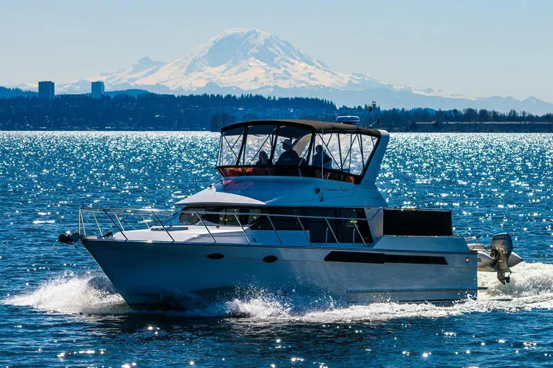 The Image of 1989 Ocean Alexander 42 yacht cruising on sparkling Lake Washington. - 0