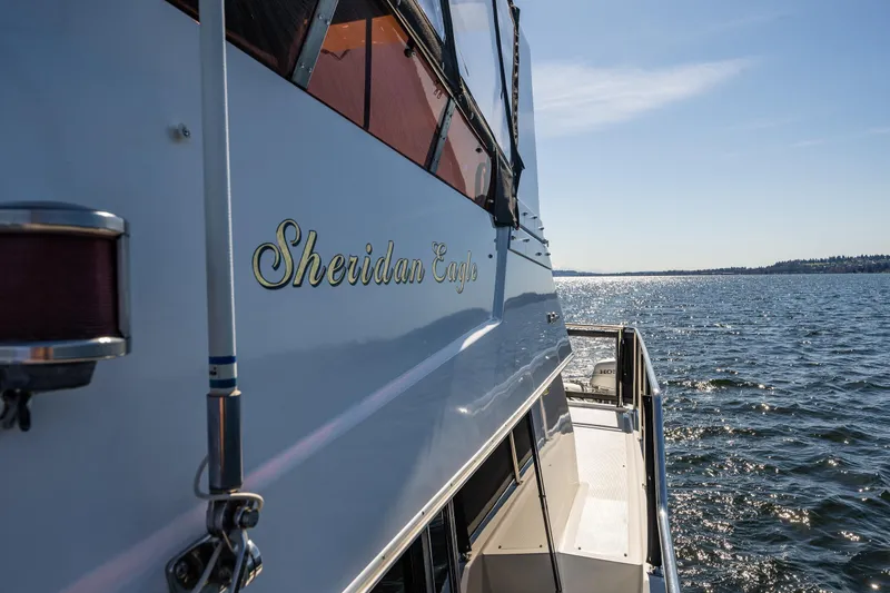 Slide: The Image of 1989 Ocean Alexander 42 yacht on water, sunny day, side view. - 25