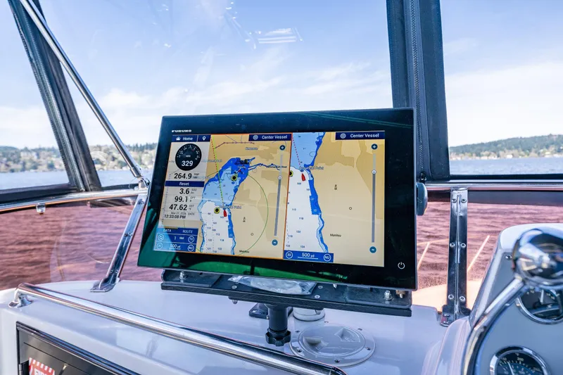 Slide: The Image of Navigation screen on 1989 Ocean Alexander 42 yacht, displaying nautical map and data. - 30