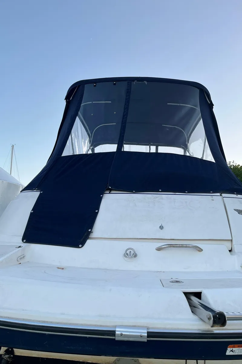 Slide: The Image of Interior of a 2006 Glastron GS 269 boat with seating area. - 12