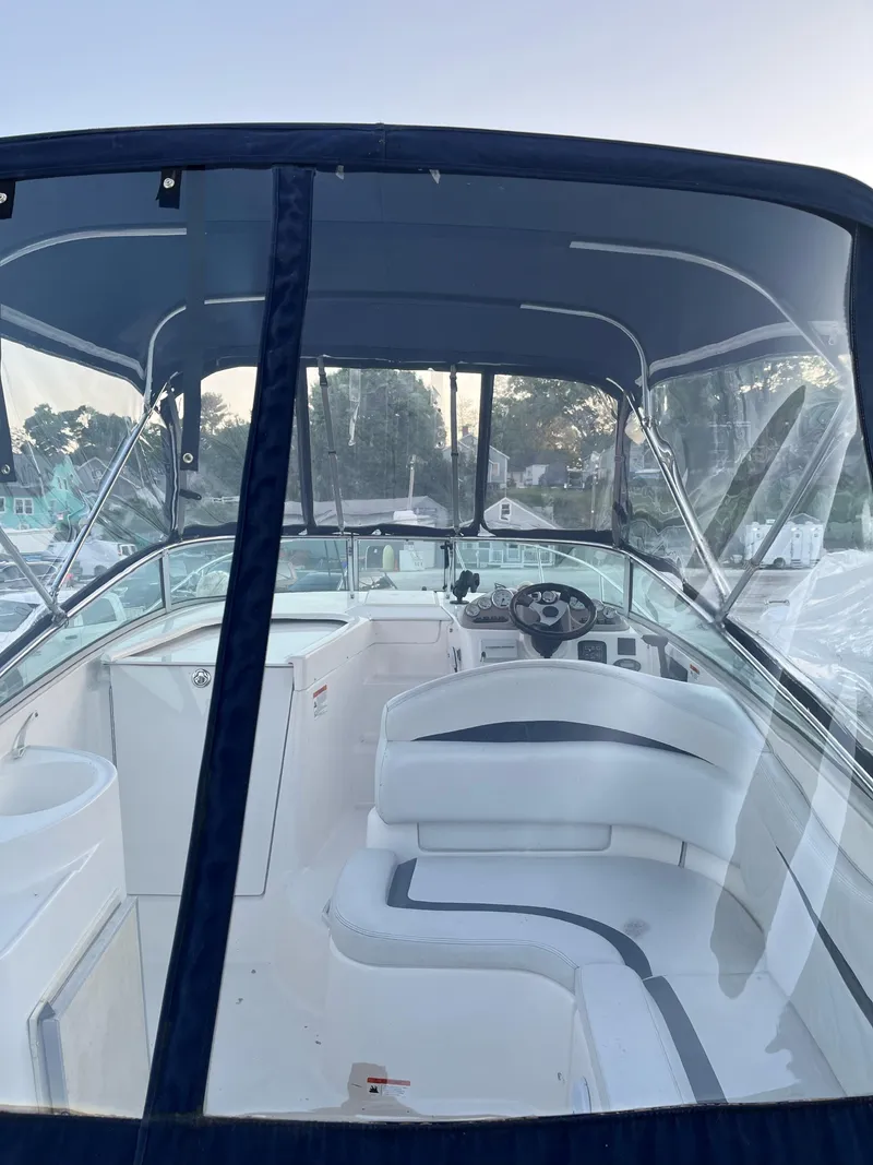 Slide: The Image of Interior of a 2006 Glastron GS 269 with sink and storage. - 14