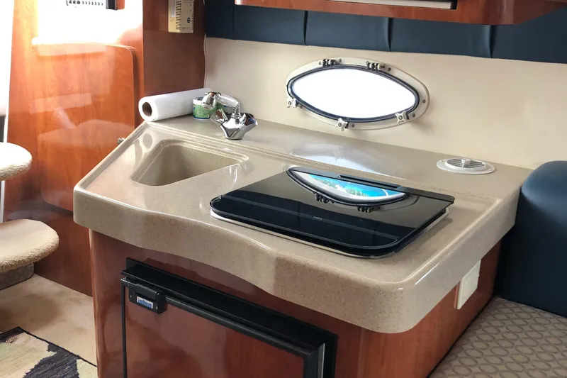 Slide: The Image of Control panel of 2006 Glastron GS 269 boat. - 23