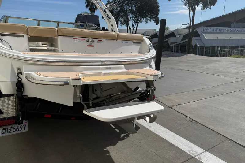 Slide: The Image of 2016 Cobalt 220 boat rear view with swim platform at Delta Marine Sales. - 7