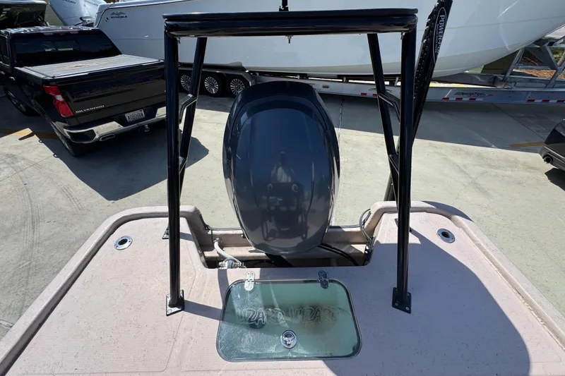 Slide: The Image of 2004 Kenner 21 VX boat with outboard motor and fishing platform. - 38