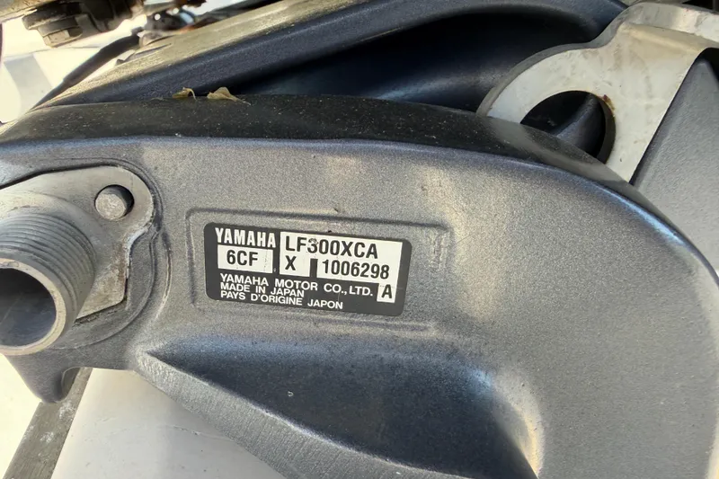 Slide: The Image of Close-up of Yamaha LF300XCA engine part on 2007 Cobia 312 Sport Cabin. - 18