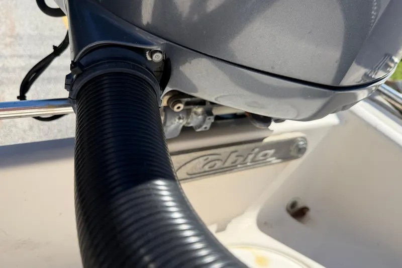 Slide: The Image of Close-up of a 2007 Cobia 312 Sport Cabin boat engine detail. - 24
