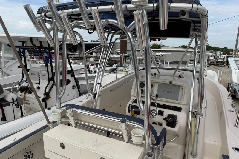 Slide: The Image of 2007 Cobia 312 Sport Cabin boat interior with Garmin navigation system. - 3