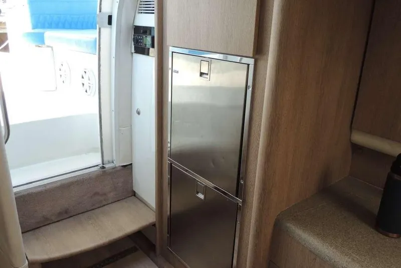 Slide: The Image of Interior of 2001 Formula 400 Super Sport yacht with stainless steel appliances. - 21