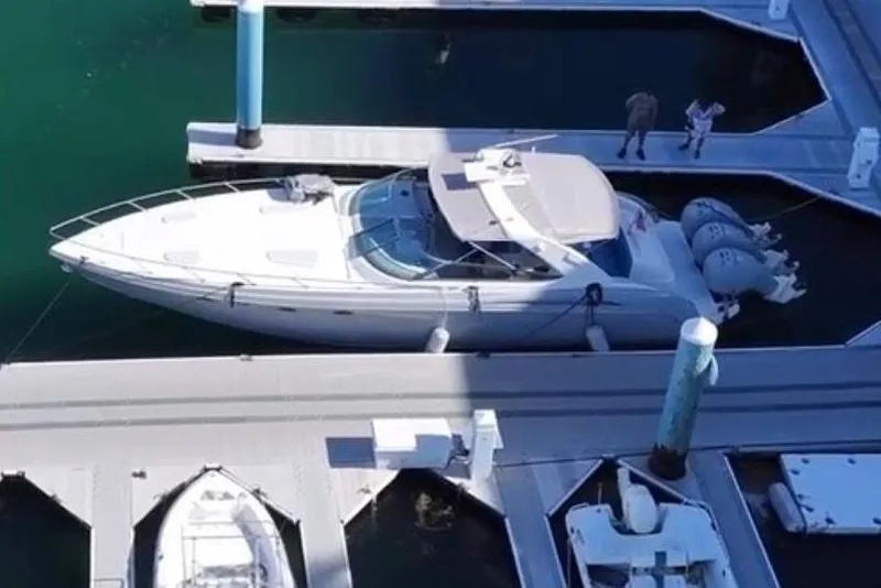 Slide: The Image of Aerial view of a 2001 Formula 400 Super Sport yacht docked. - 32