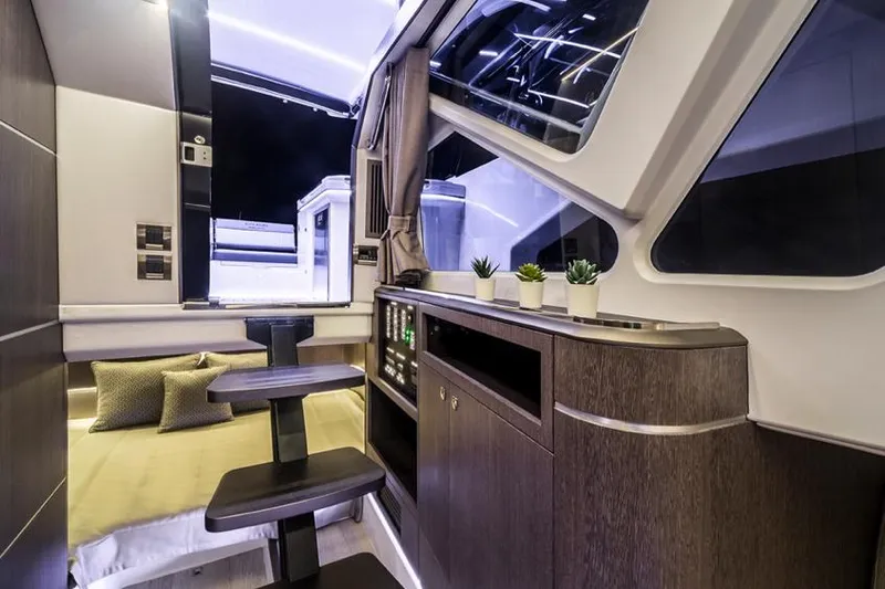 Slide: The Image of Manufacturer Provided Image: Interior of 2024 Galeon 325 GTO yacht with modern design and cozy sleeping area. - 12