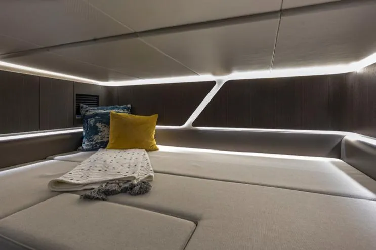 Slide: The Image of Manufacturer Provided Image: 2024 Galeon 325 GTO cabin interior with modern lighting and cozy bedding. - 14